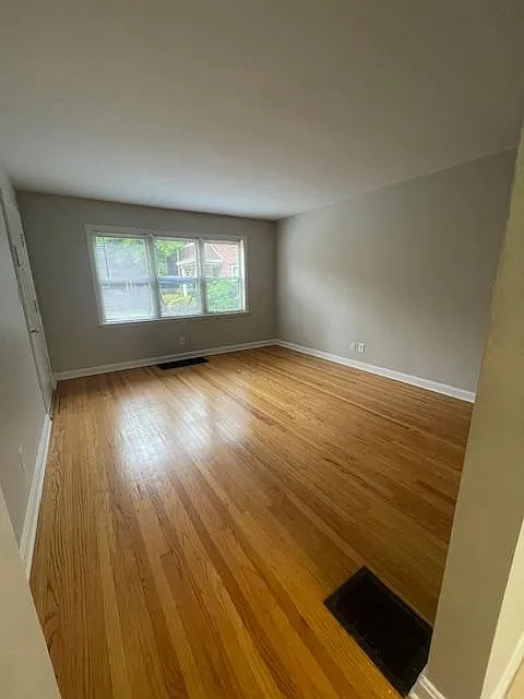 Spacious living room with tons of natural light. 